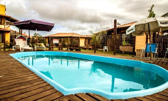 Cabanas Do Rosa Praia do Rosa Esterno foto